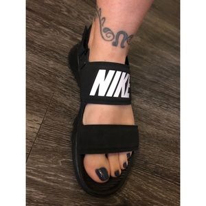 Black Nike strap on sandals